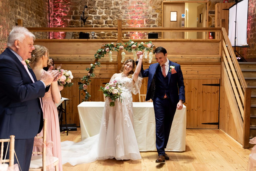 Barns at Hunsbury Hill wedding venue Northamptonshire. Wedding photographer Northants. 