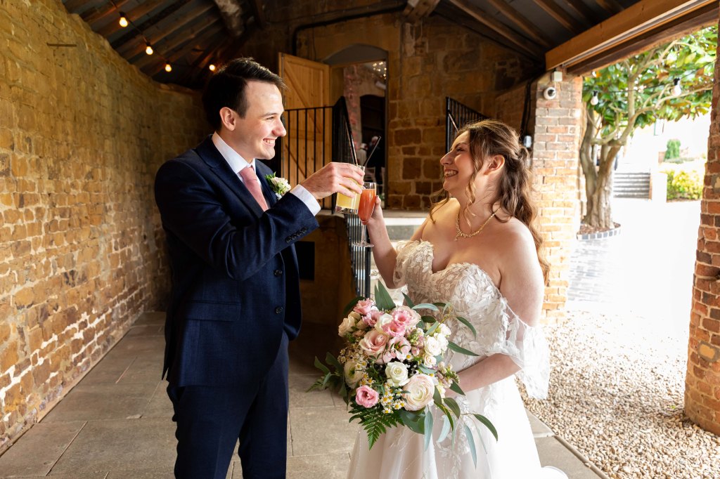 Barns at Hunsbury Hill wedding venue Northamptonshire. Wedding photographer Northants. 
