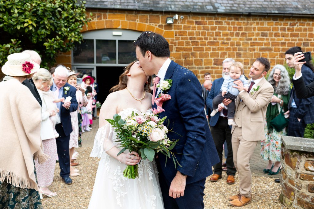 Barns at Hunsbury Hill wedding venue Northamptonshire. Wedding photographer Northants. 